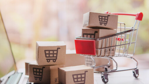 Photo of a person pushing products onto a transport vehicle