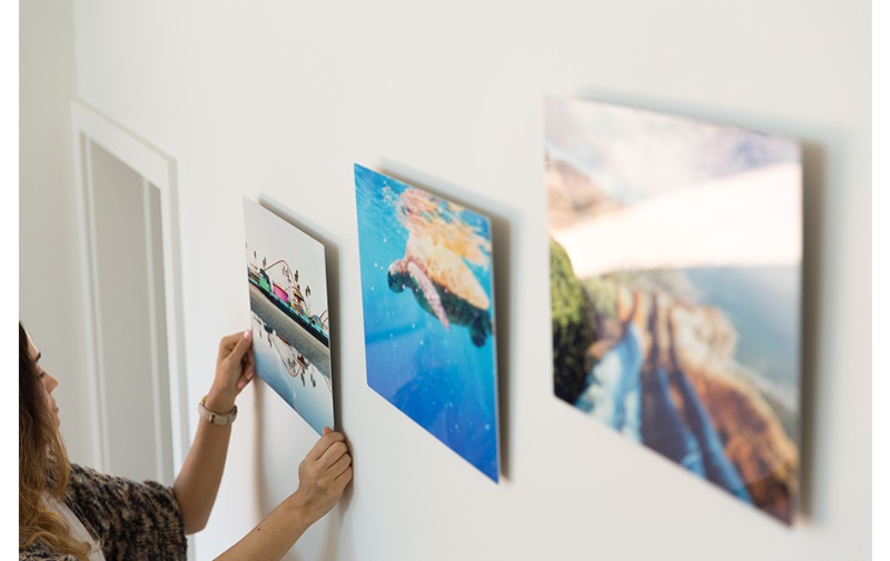 metal prints display on wall